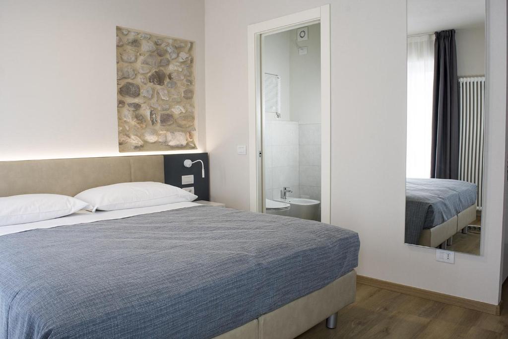 Postel nebo postele na pokoji v ubytování Casa Beccherie