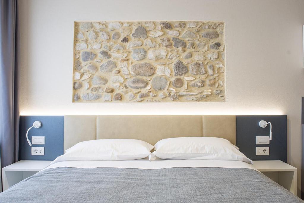 Postel nebo postele na pokoji v ubytování Casa Beccherie