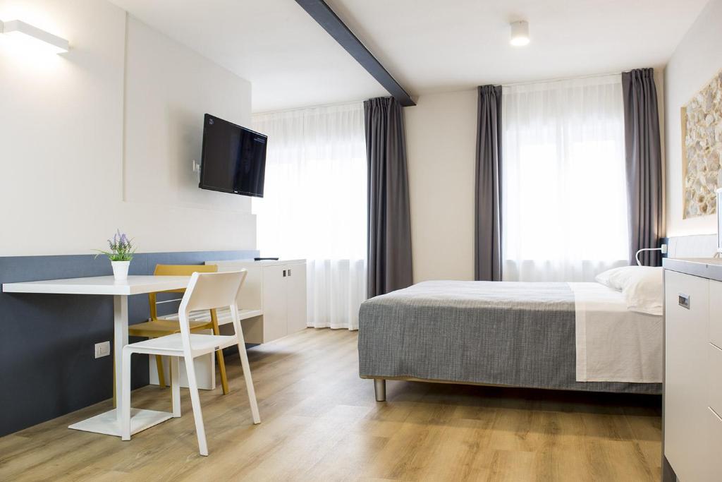 Postel nebo postele na pokoji v ubytování Casa Beccherie