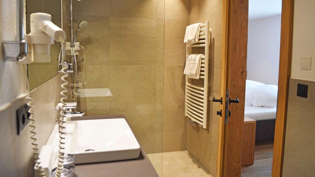 Koupelna v ubytování Hotel Trenker