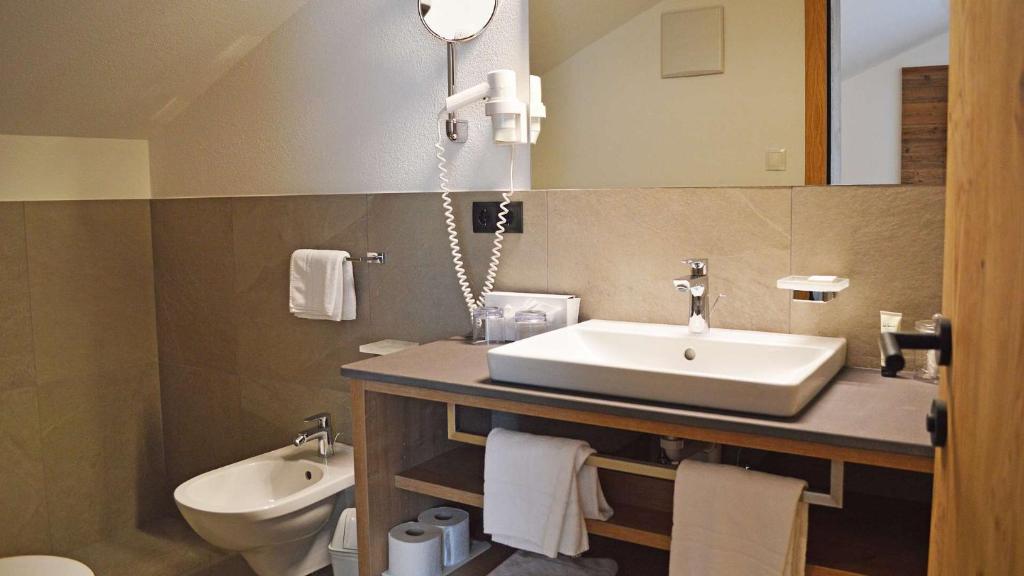 Koupelna v ubytování Hotel Trenker
