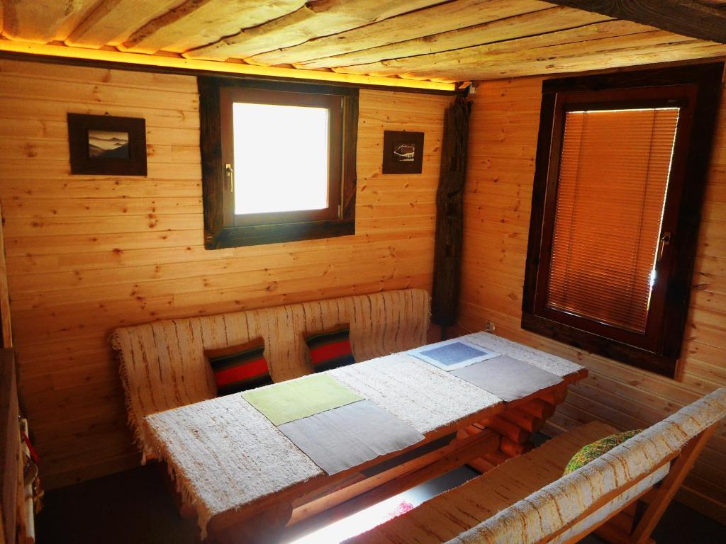 Postel nebo postele na pokoji v ubytování Ranč pod Hájom