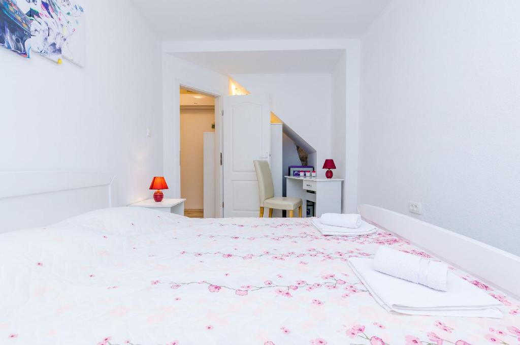 Posteľ alebo postele v izbe v ubytovaní Apartment Little Star II