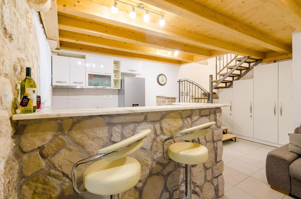 Kuchyňa alebo kuchynka v ubytovaní Apartment Little Star II