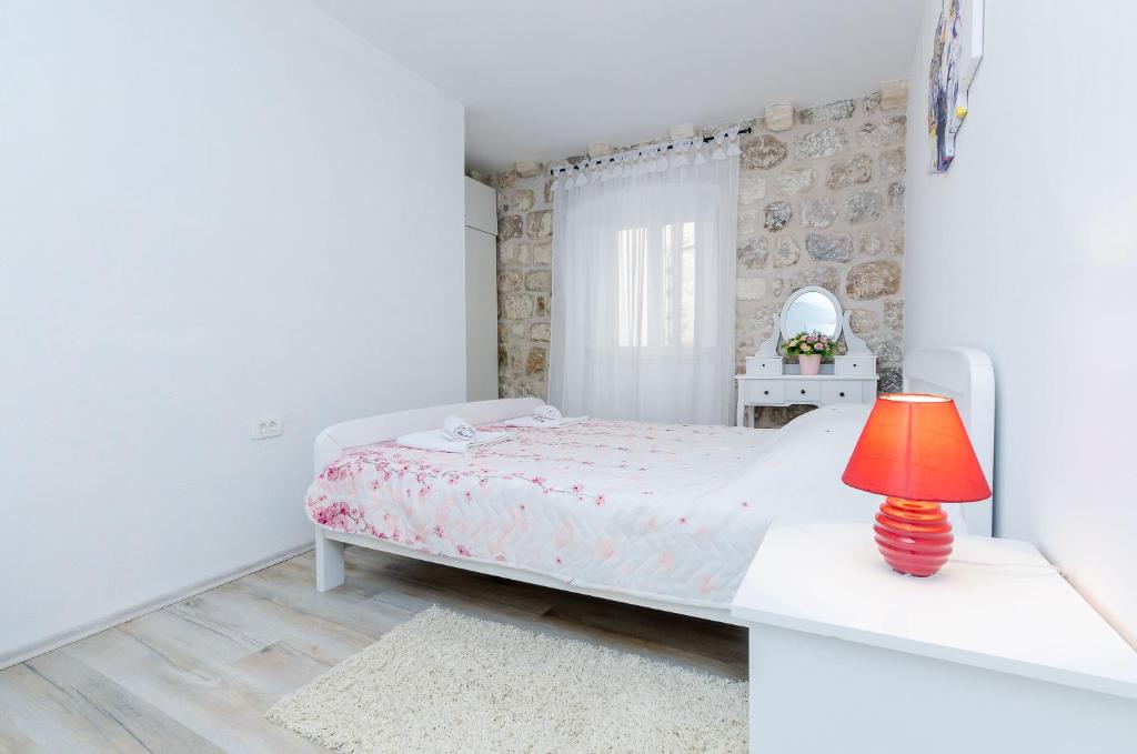 Posteľ alebo postele v izbe v ubytovaní Apartment Little Star II