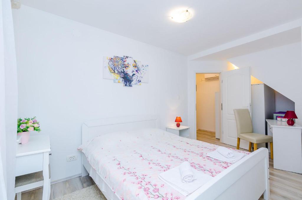 Posteľ alebo postele v izbe v ubytovaní Apartment Little Star II