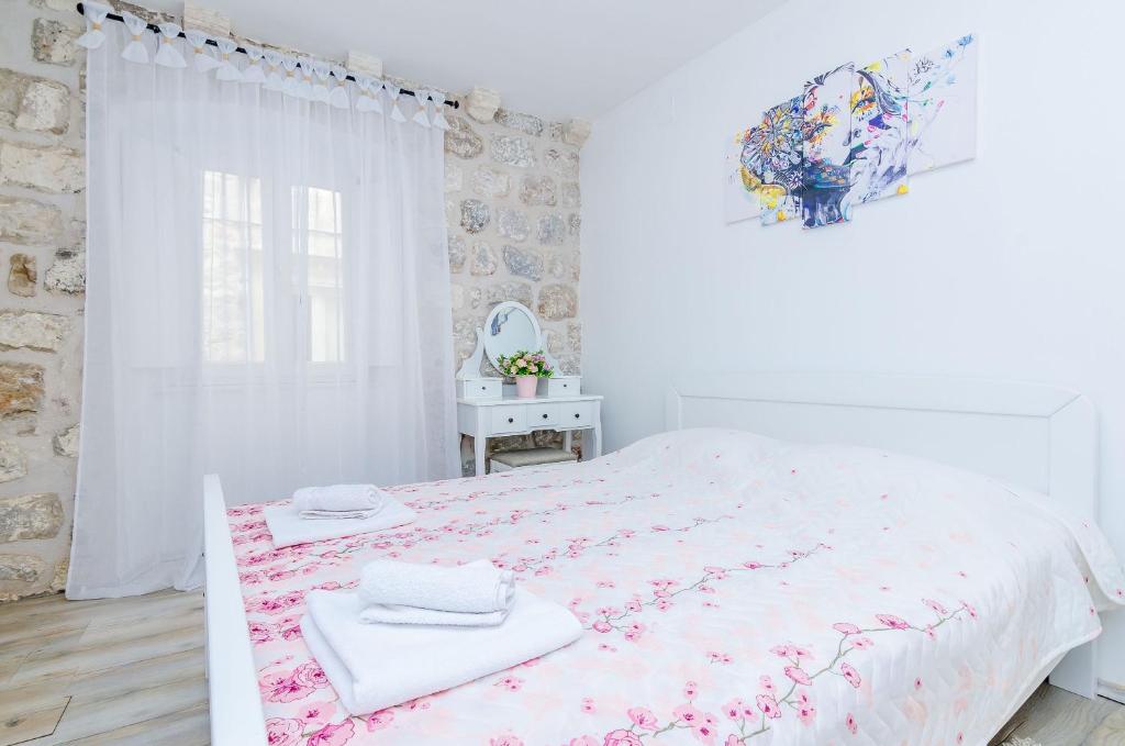 Posteľ alebo postele v izbe v ubytovaní Apartment Little Star II