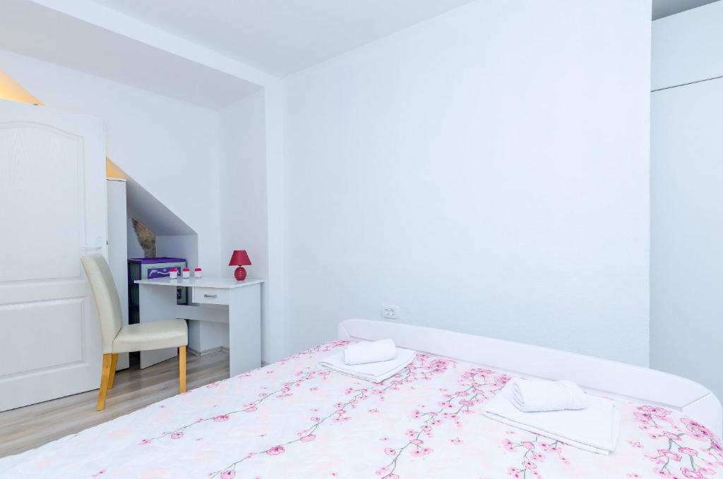 Posteľ alebo postele v izbe v ubytovaní Apartment Little Star II