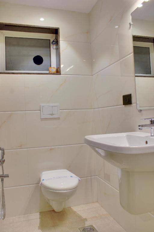 Koupelna v ubytování Regenta Inn Palacio De Goa, Panjim