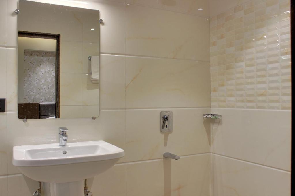 Koupelna v ubytování Regenta Inn Palacio De Goa, Panjim
