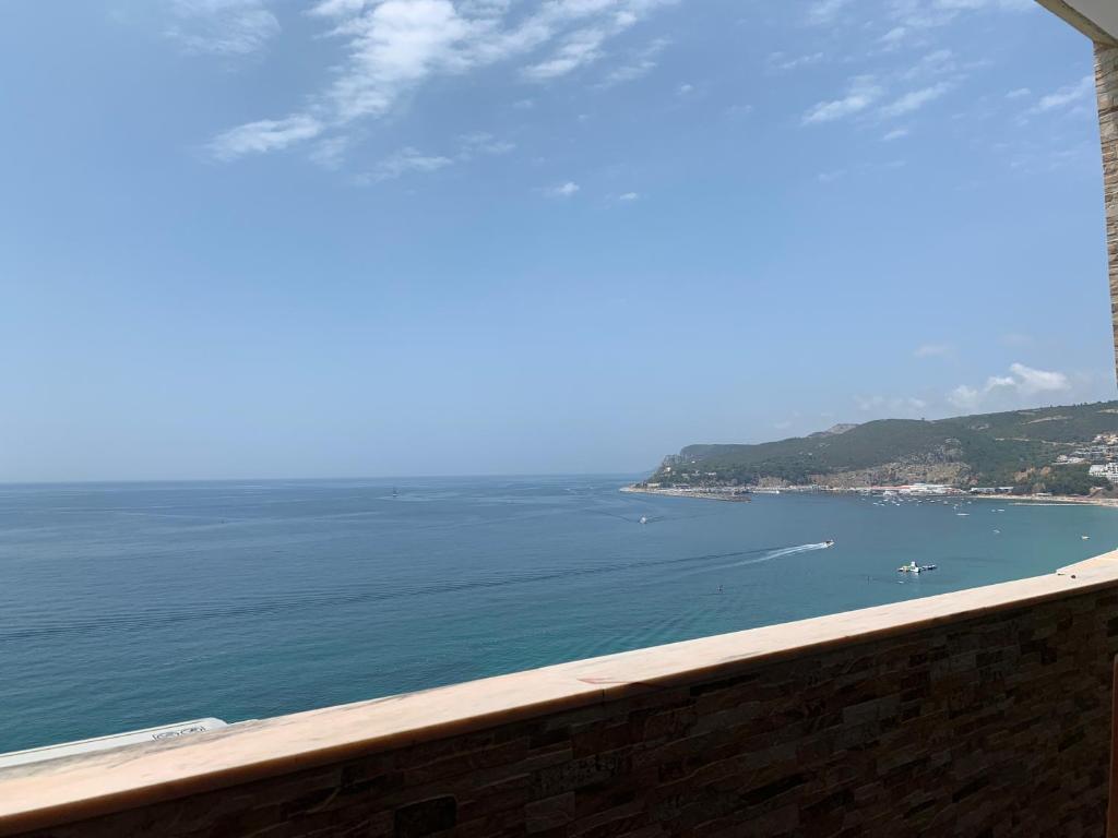a view of the ocean from a balcony at Sun & Sea 509 in Sesimbra