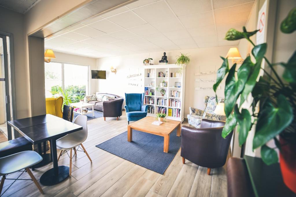 Posezení v ubytování Hôtel Le Plaisance