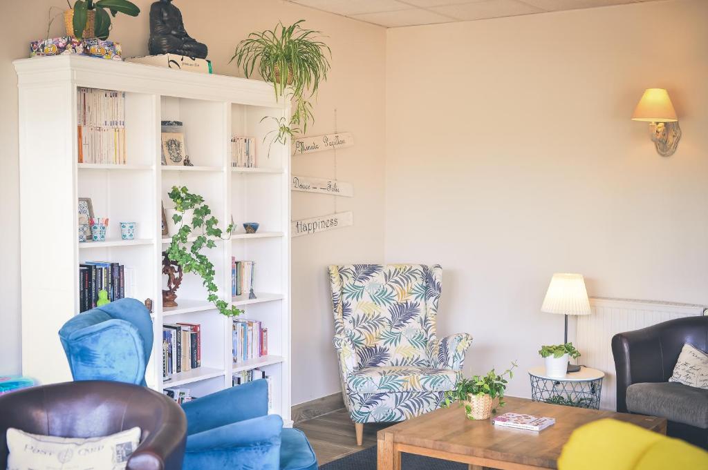 Posezení v ubytování Hôtel Le Plaisance