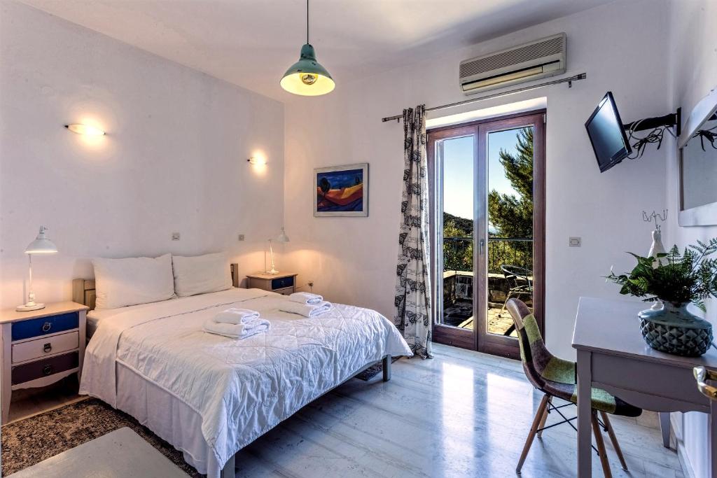 Postel nebo postele na pokoji v ubytování Vardia Hotel
