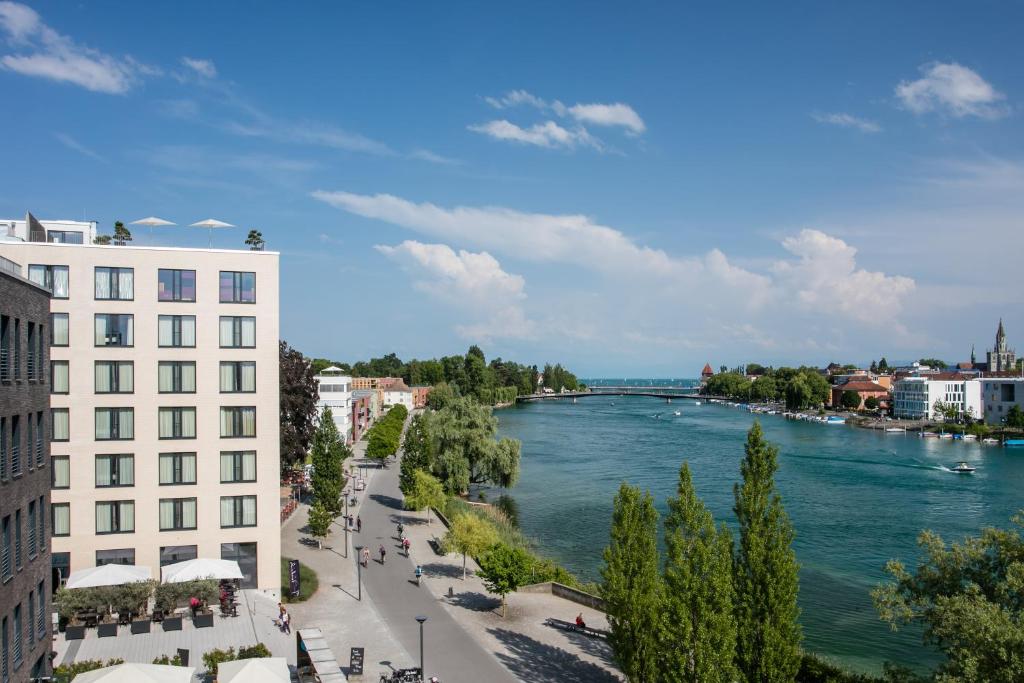 a view of a river from a building at Hotel 47° in Konstanz