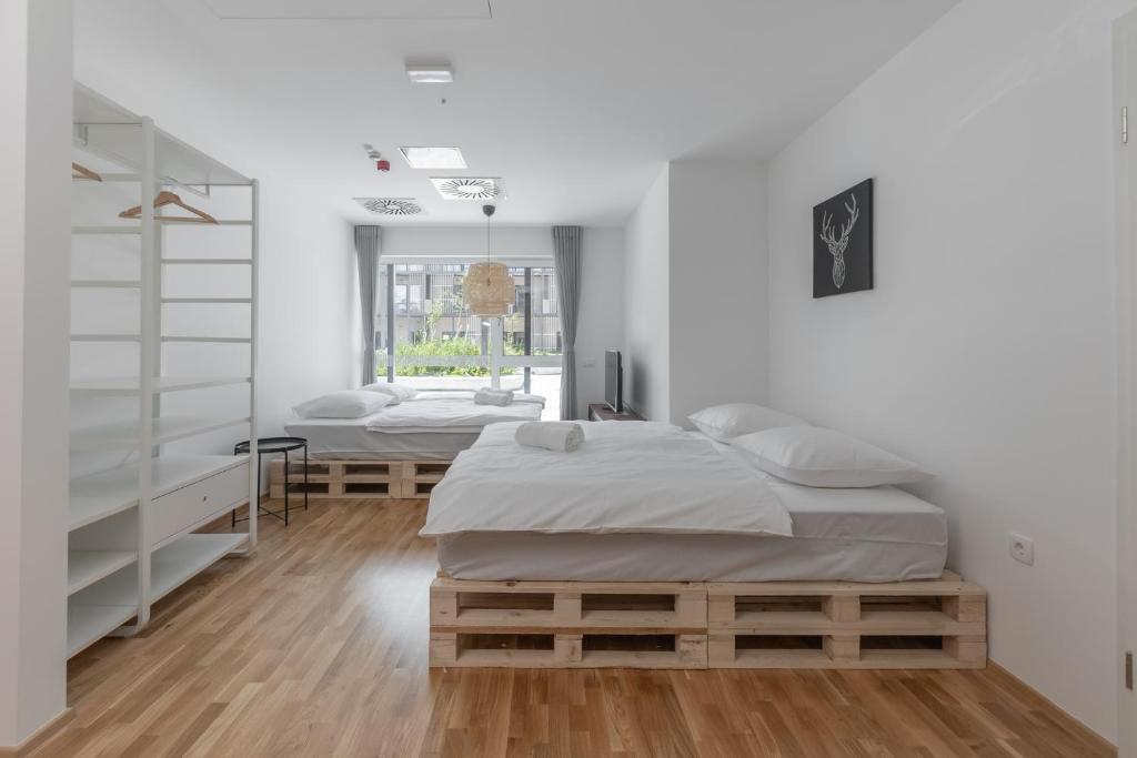 Postel nebo postele na pokoji v ubytování Pearl Bled