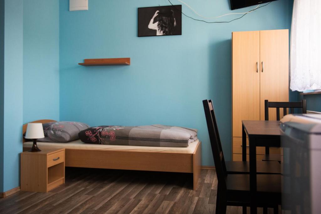 Postel nebo postele na pokoji v ubytování Penzion Veritas