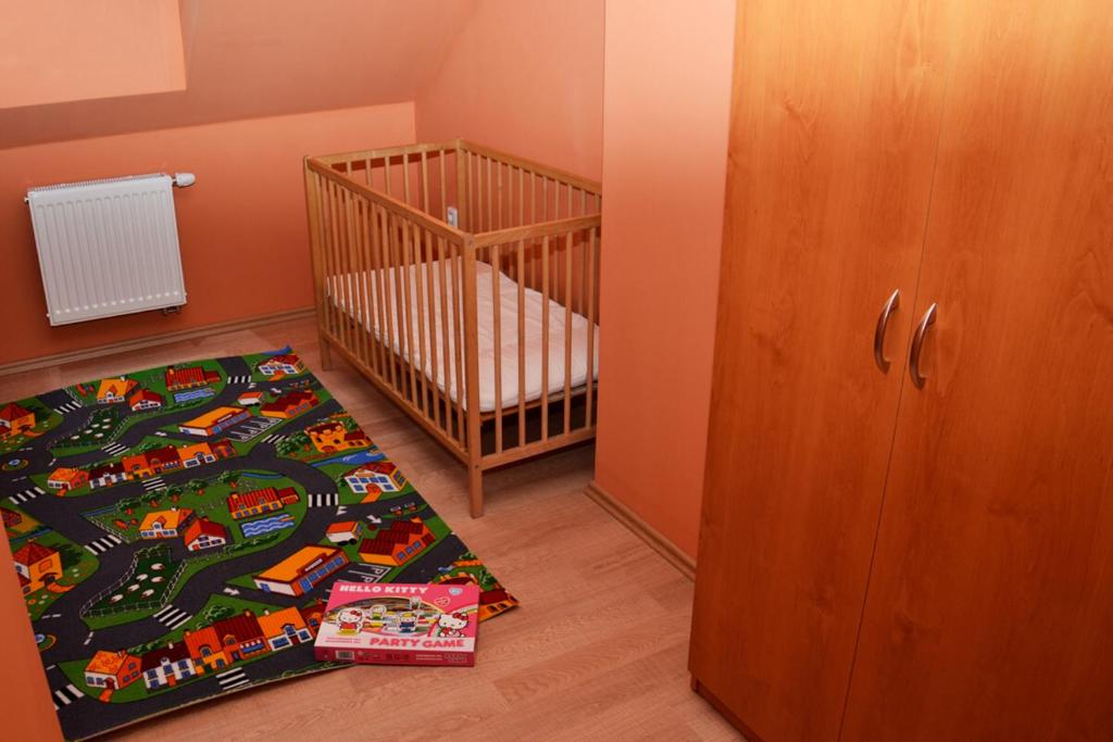 Postel nebo postele na pokoji v ubytování Penzion Veritas