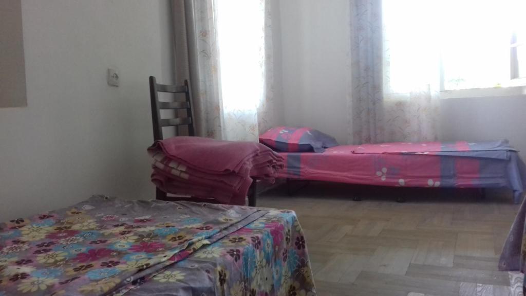 Postel nebo postele na pokoji v ubytování Cabernet Tali