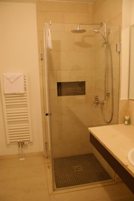 Koupelna v ubytování KH Hotel mit Restaurant