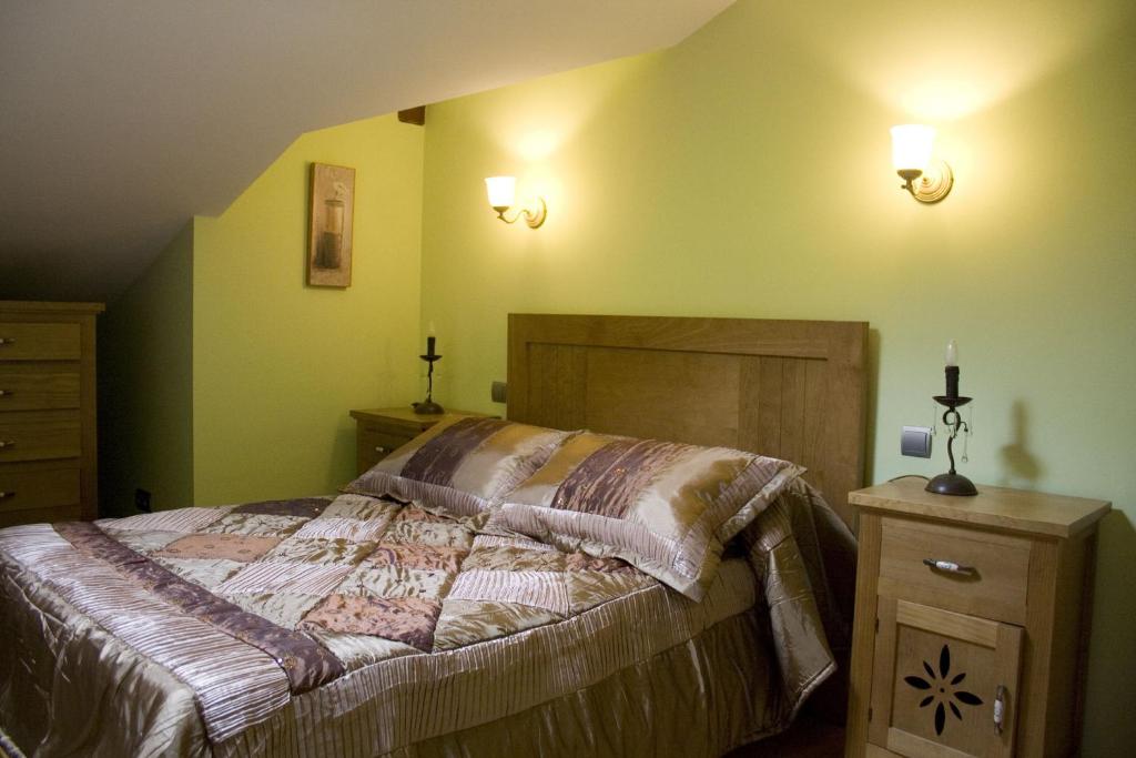 Postel nebo postele na pokoji v ubytování Posada El Arrabal