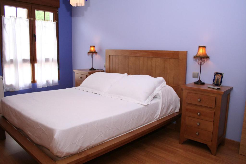Postel nebo postele na pokoji v ubytování Posada El Arrabal