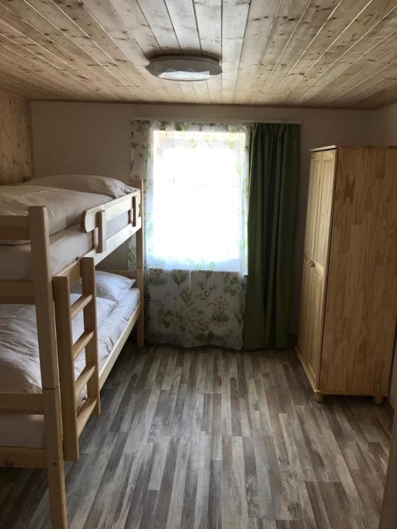 Postel nebo postele na pokoji v ubytování Apartmány Michaela