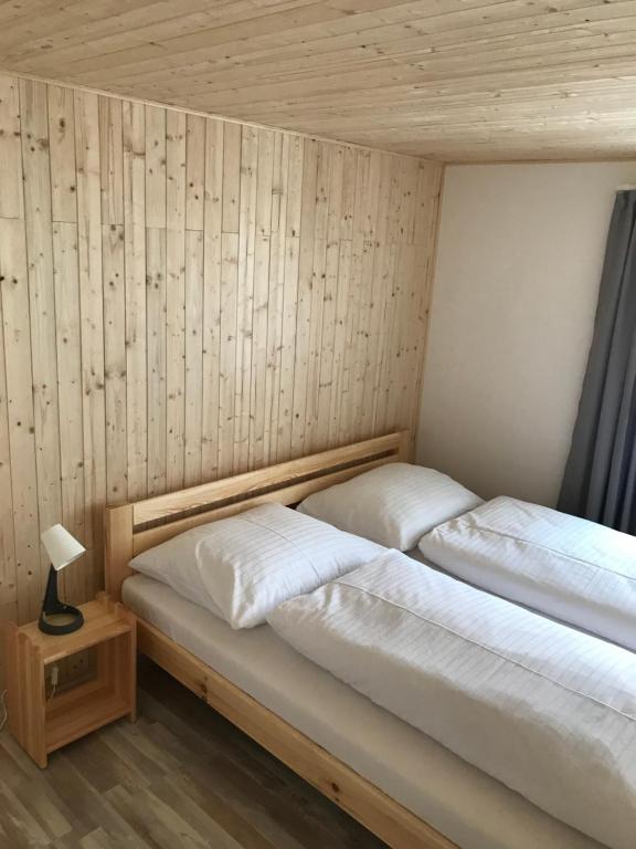 Postel nebo postele na pokoji v ubytování Apartmány Michaela