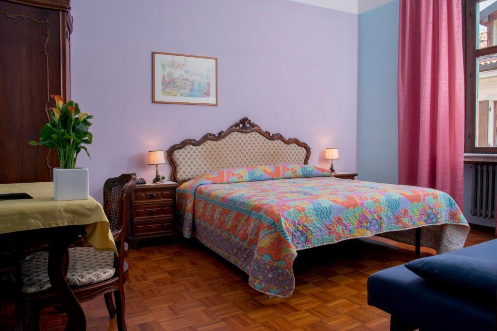 Postel nebo postele na pokoji v ubytování Hotel Florida