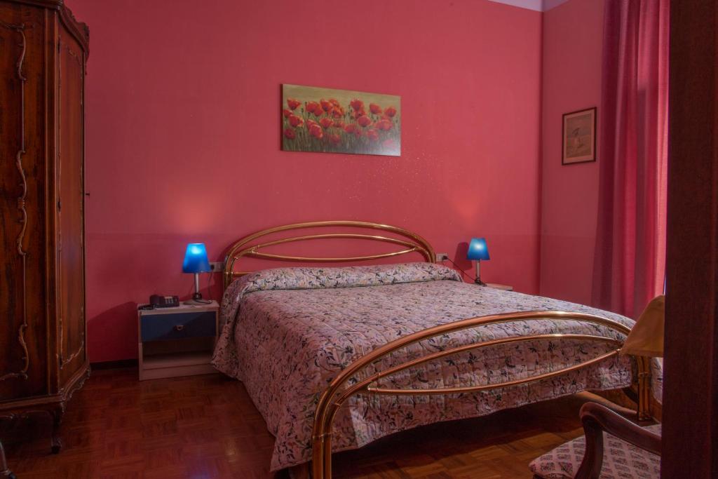 Postel nebo postele na pokoji v ubytování Hotel Florida