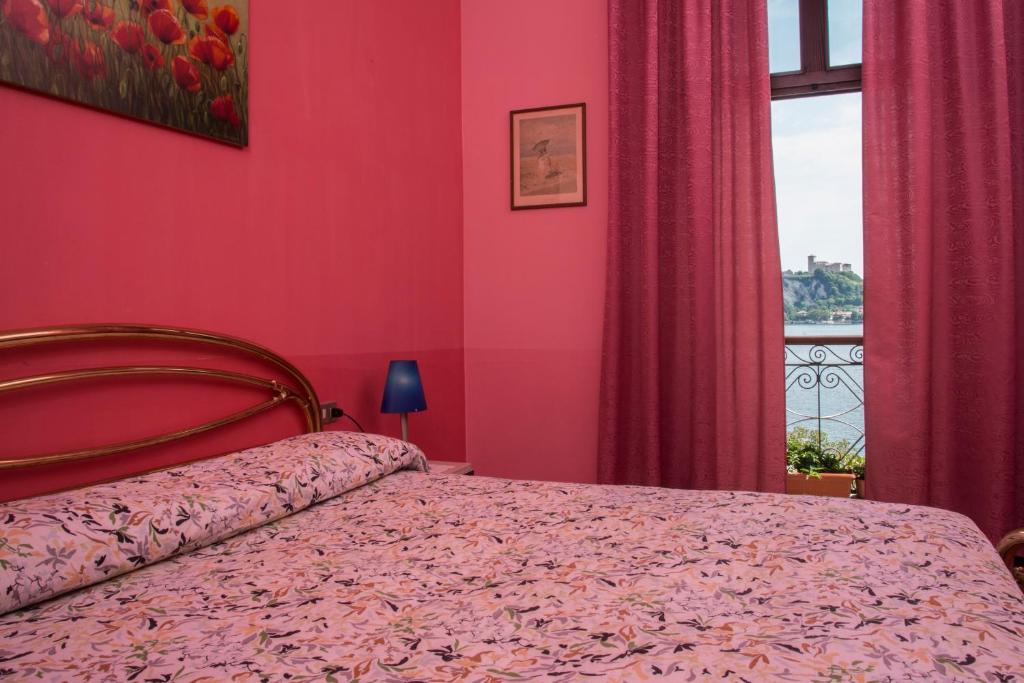Postel nebo postele na pokoji v ubytování Hotel Florida