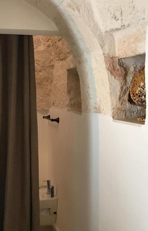 Koupelna v ubytování Trulli Pietraverde