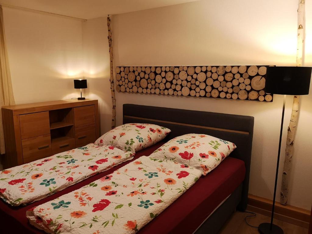 Postel nebo postele na pokoji v ubytování Waldwipfel-Appartement