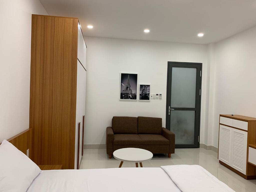 Postel nebo postele na pokoji v ubytování 319 Liên Phường, Q9