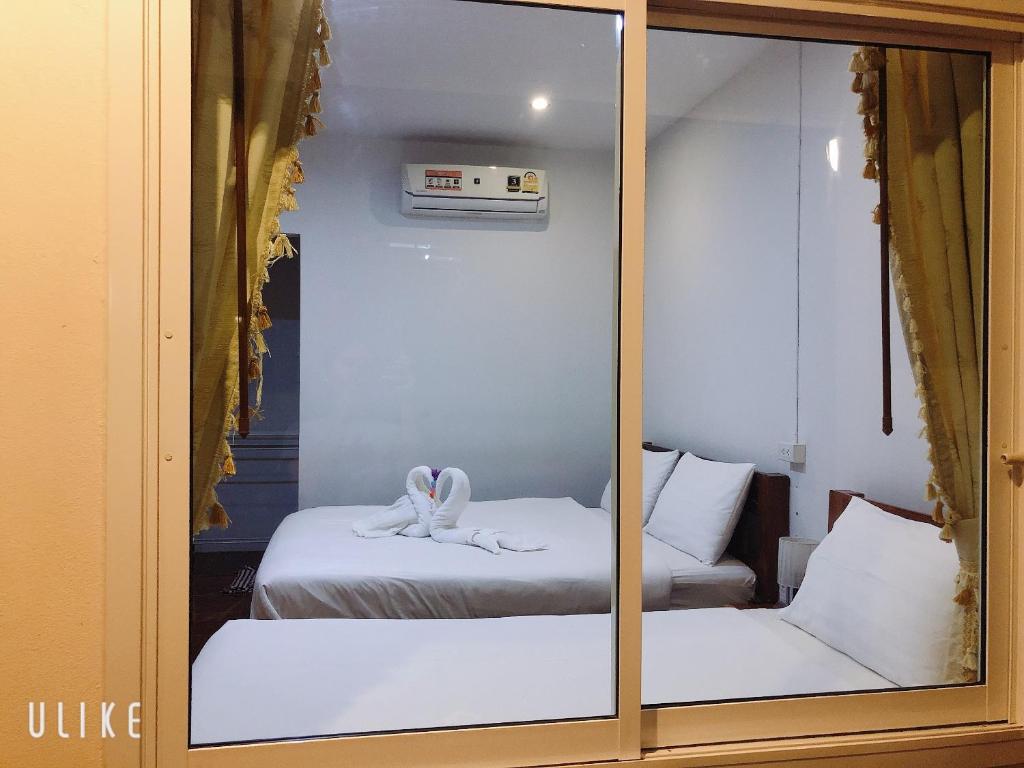Thosawan Resort ทศวรรณ รีสอร์ท - トリプルルーム