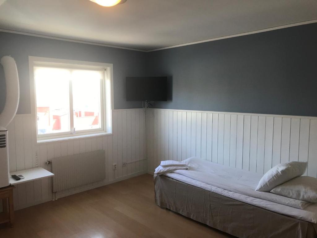 Ένα ή περισσότερα κρεβάτια σε δωμάτιο στο Klovabo Bed & Breakfast