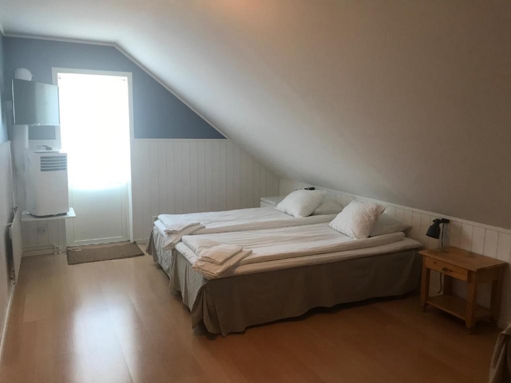 Ένα ή περισσότερα κρεβάτια σε δωμάτιο στο Klovabo Bed & Breakfast