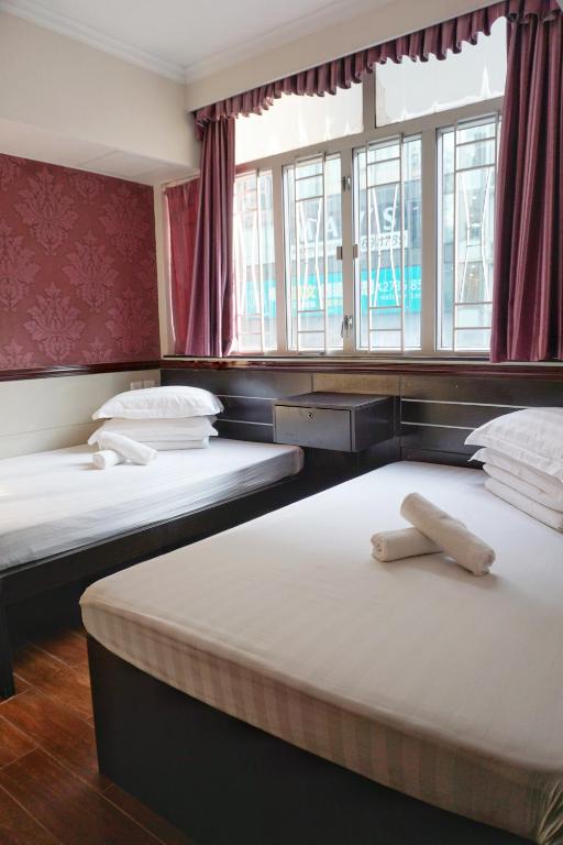 Postel nebo postele na pokoji v ubytování Hang Ho Hostel