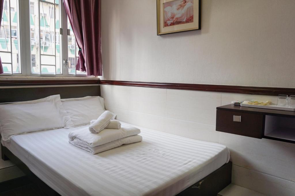 Postel nebo postele na pokoji v ubytování Hang Ho Hostel