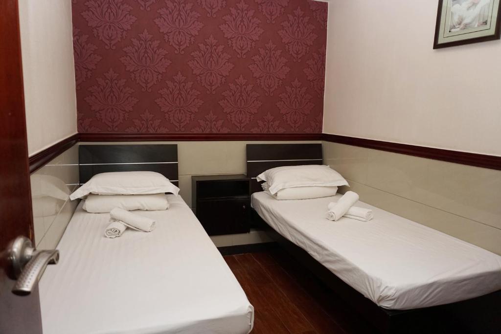 Postel nebo postele na pokoji v ubytování Hang Ho Hostel
