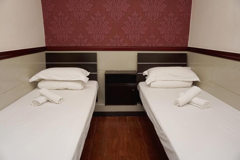 Postel nebo postele na pokoji v ubytování Hang Ho Hostel