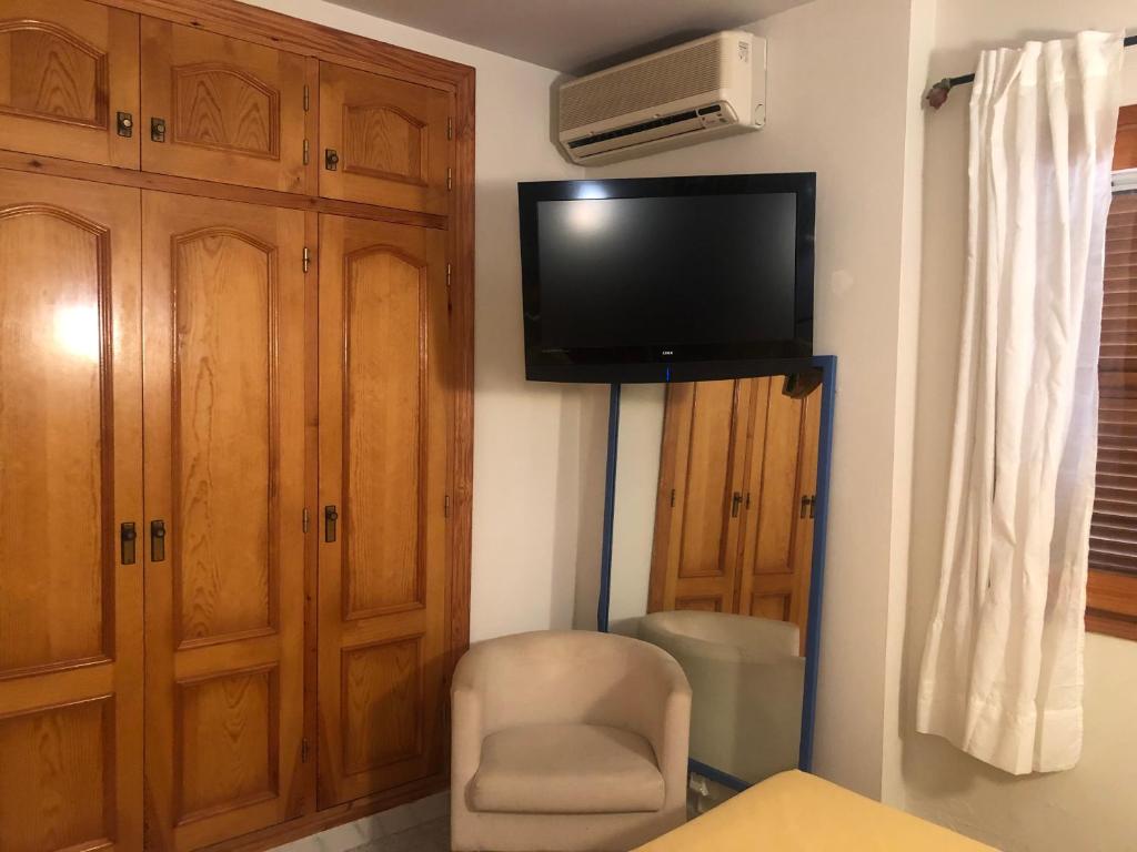 A television and/or entertainment centre at Torre Almadrava