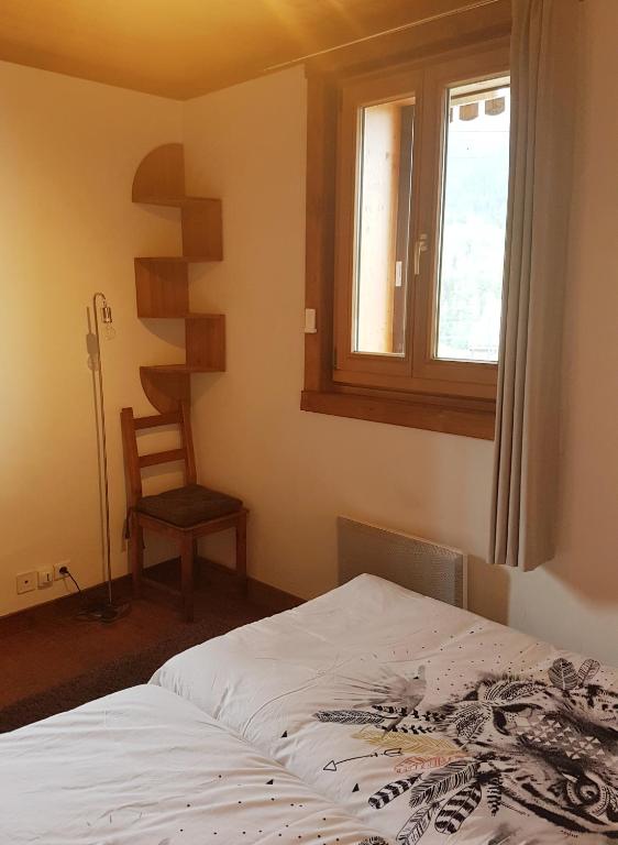 Postel nebo postele na pokoji v ubytování Chaleureux 2 pièces avec terrasse à Seez