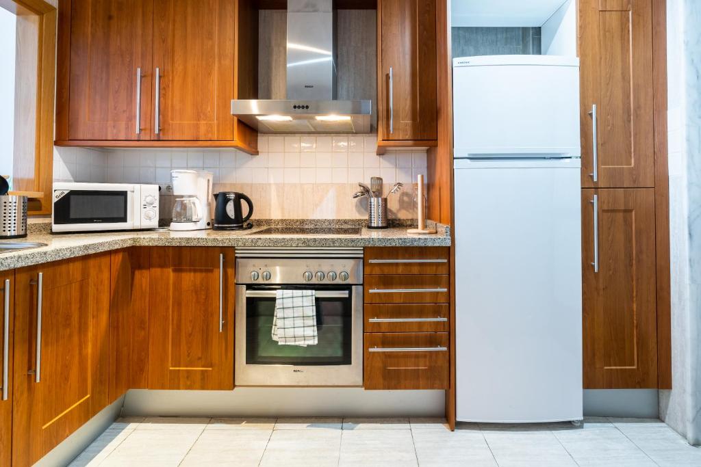 Kuchyňa alebo kuchynka v ubytovaní Sur Suites Buena Vista