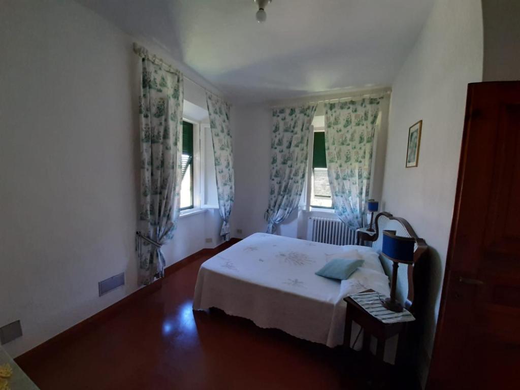 Postel nebo postele na pokoji v ubytování Residenza La Limonaia