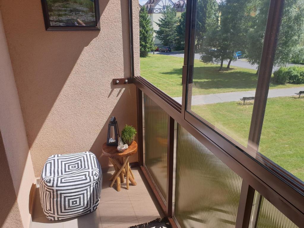 Vonkajšia záhrada v ubytovaní Apartman Orlie Pierko - Tatranska Lomnica