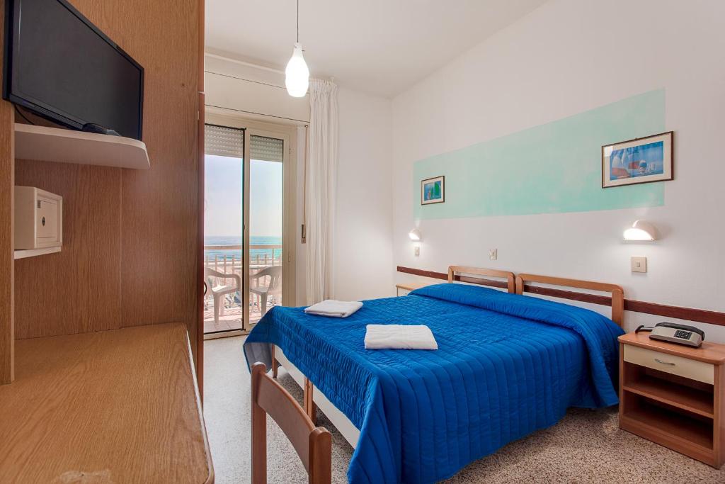 Postel nebo postele na pokoji v ubytování Hotel Buenos Aires
