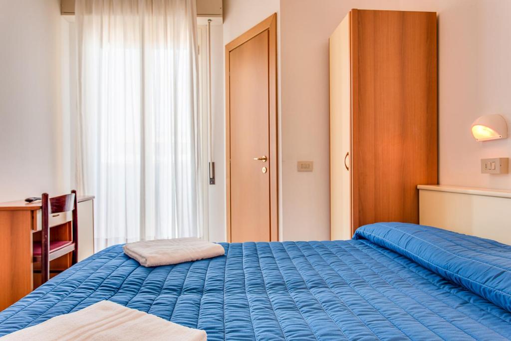 Postel nebo postele na pokoji v ubytování Hotel Buenos Aires