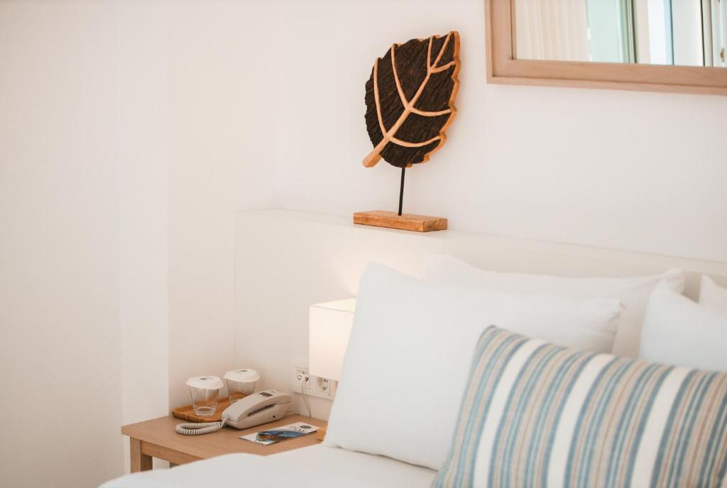 Postel nebo postele na pokoji v ubytování Dias Hotel