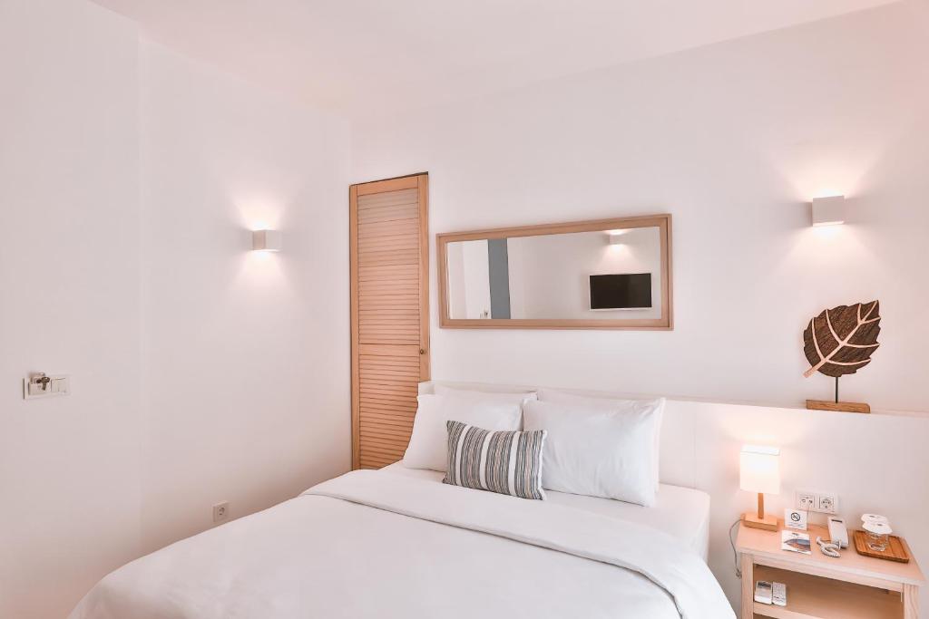 Postel nebo postele na pokoji v ubytování Dias Hotel